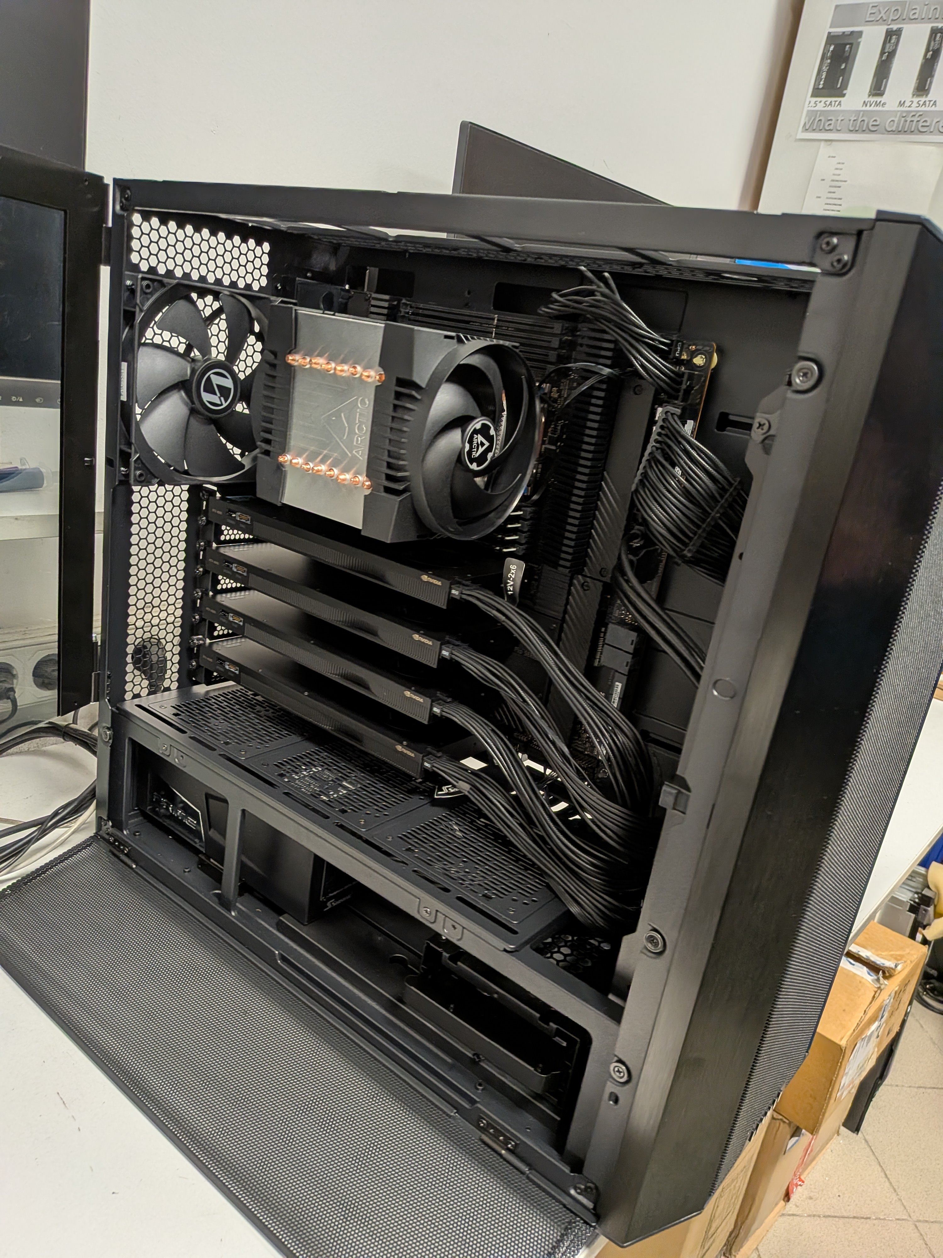 GPU cluster — open chassis with multi-GPU array